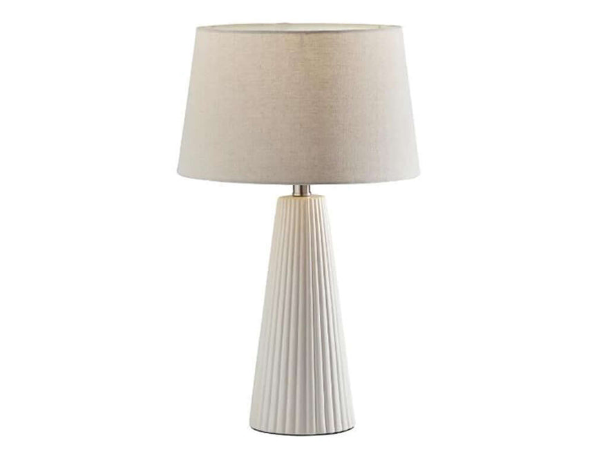 Textured ceramic lamp with a pleated base and soft fabric shade for end tables and nightstands.
